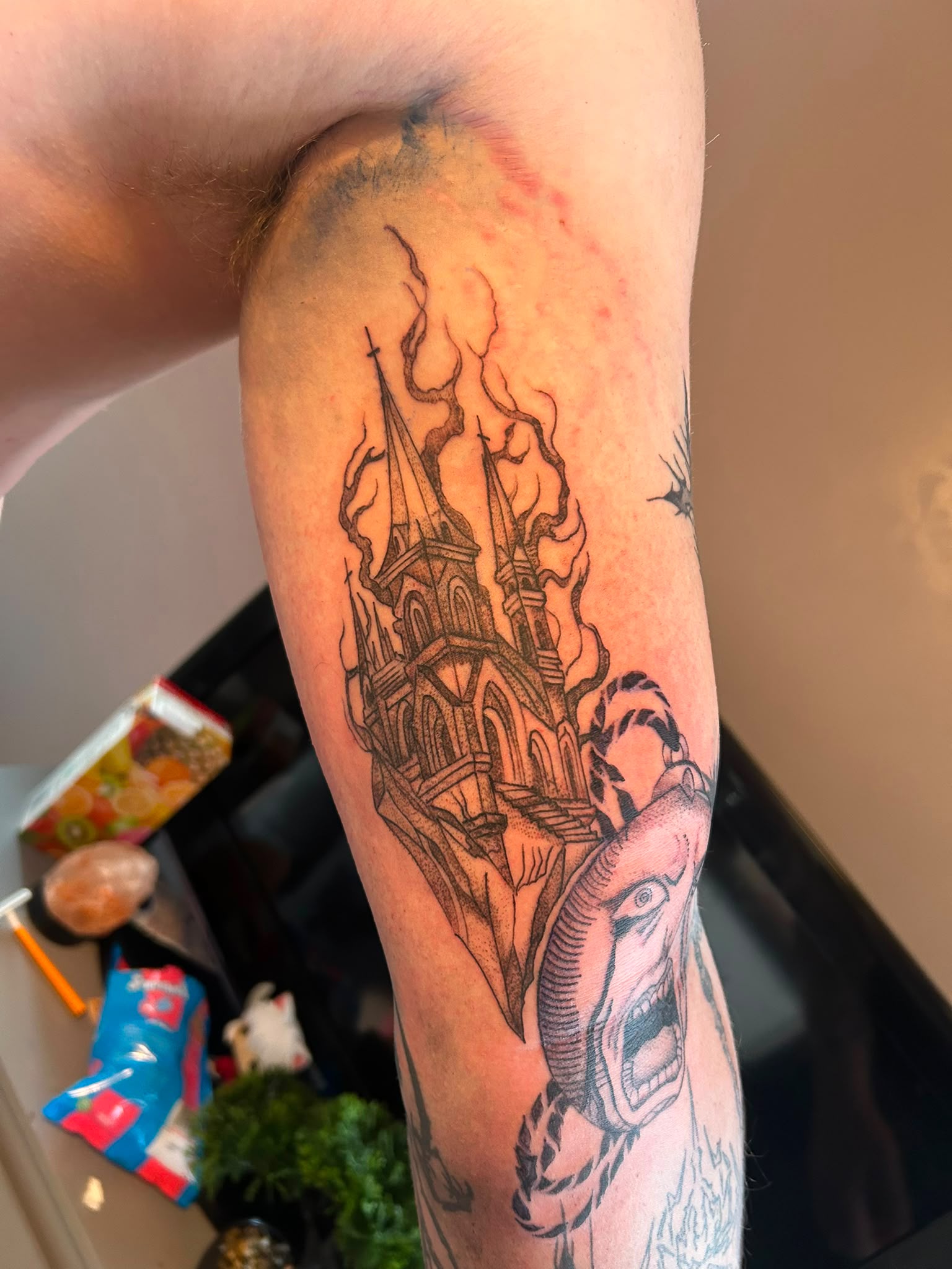Gothic castle and elephant tattoo